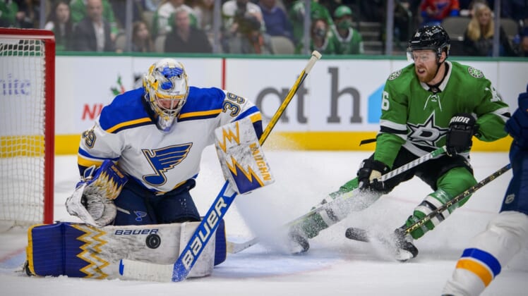 Dec 14, 2021; Dallas, Texas, USA; St. Louis Blues goaltender Charlie Lindgren (39) stops a shot by Dallas Stars center Joe Pavelski (16) during the second period at the American Airlines Center. Mandatory Credit: Jerome Miron-USA TODAY Sports