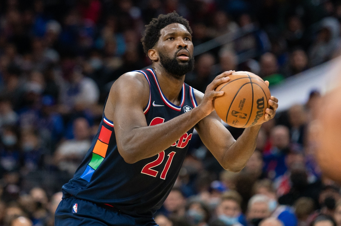 Dec 15, 2021; Philadelphia, Pennsylvania, USA; Philadelphia 76ers center Joel Embiid (21) shoots the ball against the Miami Heat during the third quarter at Wells Fargo Center. Mandatory Credit: Bill Streicher-USA TODAY Sports