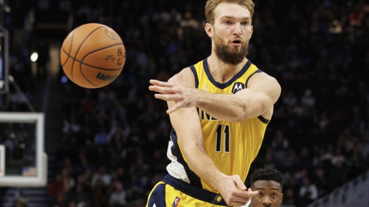 Dec 15, 2021; Milwaukee, Wisconsin, USA;  Indiana Pacers forward Domantas Sabonis (11) passes the ball during the fourth quarter against the Milwaukee Bucks at Fiserv Forum. Mandatory Credit: Jeff Hanisch-USA TODAY Sports