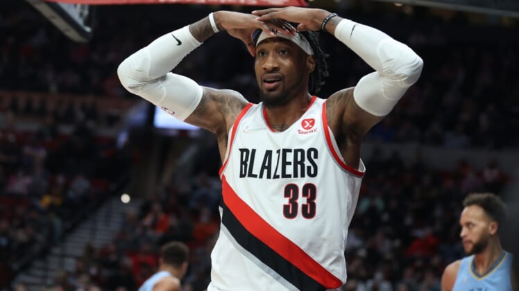 Dec 15, 2021; Portland, Oregon, USA;  Portland Trail Blazers forward Robert Covington (33) reacts after being called for a foul against the Memphis Grizzlies in the second half at Moda Center. Mandatory Credit: Jaime Valdez-USA TODAY Sports