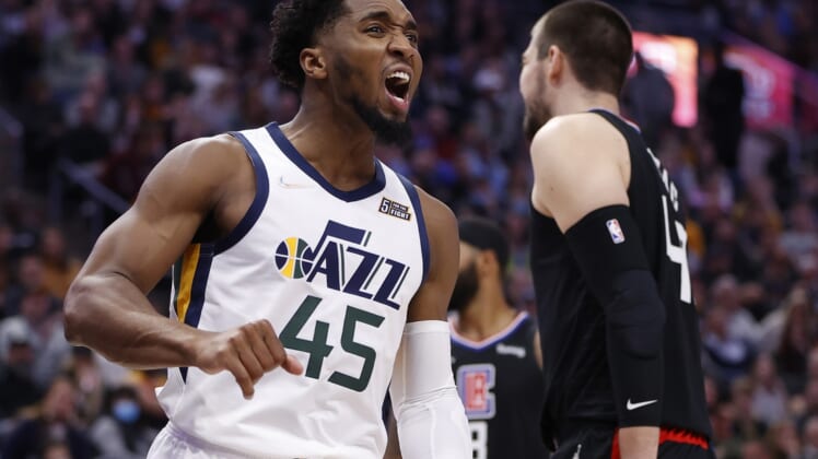 Dec 15, 2021; Salt Lake City, Utah, USA; Utah Jazz guard Donovan Mitchell (45) reacts in after a basket in the second quarter against the LA Clippers at Vivint Arena. Mandatory Credit: Jeffrey Swinger-USA TODAY Sports