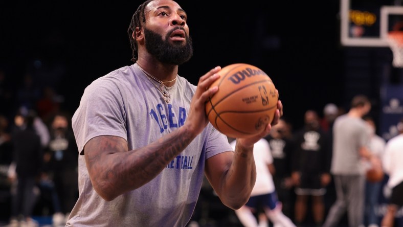 Dec 16, 2021; Brooklyn, New York, USA;  Philadelphia 76ers center Andre Drummond (1) shoots the ball during warm-ups against the Brooklyn Nets at Barclays Center. Mandatory Credit: Vincent Carchietta-USA TODAY Sports