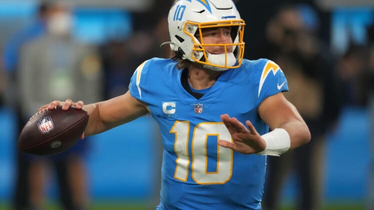 Dec 16, 2021; Inglewood, California, USA; Los Angeles Chargers quarterback Justin Herbert (10) throws a pass against the Kansas City Chiefs in the second half at SoFi Stadium. Mandatory Credit: Kirby Lee-USA TODAY Sports