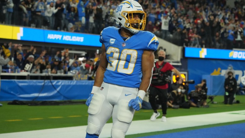 Dec 16, 2021; Inglewood, California, USA; Los Angeles Chargers running back Austin Ekeler (30) celebrates after a touchdown against the Kansas City Chiefs in the second half at SoFi Stadium. Mandatory Credit: Kirby Lee-USA TODAY Sports