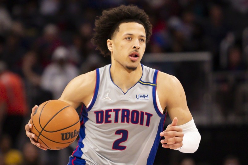 Dec 18, 2021; Detroit, Michigan, USA; Detroit Pistons guard Cade Cunningham (2) dribbles the ball during the fourth quarter against the Houston Rockets at Little Caesars Arena. Mandatory Credit: Raj Mehta-USA TODAY Sports