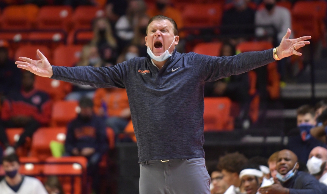 Dec 18, 2021; Champaign, Illinois, USA;  Illinois Fighting Illini head coach Brad Underwood directs his players during the second half against the Saint Francis Red Flash at State Farm Center. Mandatory Credit: Ron Johnson-USA TODAY Sports