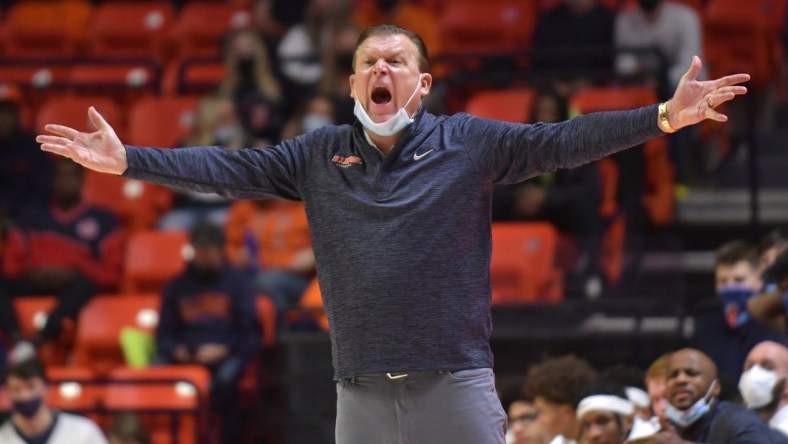 Dec 18, 2021; Champaign, Illinois, USA;  Illinois Fighting Illini head coach Brad Underwood directs his players during the second half against the Saint Francis Red Flash at State Farm Center. Mandatory Credit: Ron Johnson-USA TODAY Sports