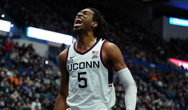 Dec 18, 2021; Hartford, Connecticut, USA; Connecticut Huskies forward Isaiah Whaley (5) reacts after a basket and foul as they take on the Providence Friars in the first half at XL Center. Mandatory Credit: David Butler II-USA TODAY Sports