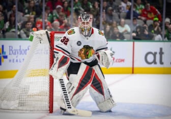 Dec 18, 2021; Dallas, Texas, USA; Chicago Blackhawks goaltender Kevin Lankinen (32) faces the Dallas Stars attack during the second period at the American Airlines Center. Mandatory Credit: Jerome Miron-USA TODAY Sports
