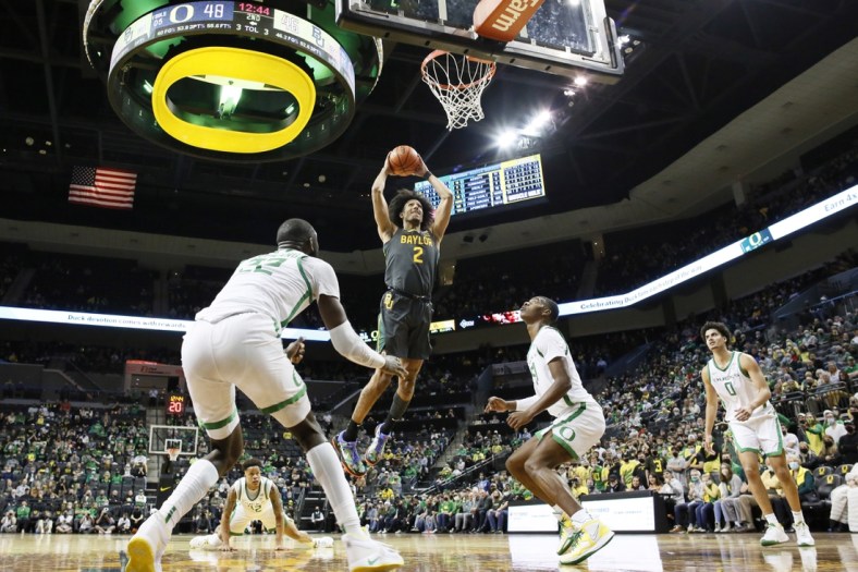 Dec 18, 2021; Eugene, Oregon, USA; Baylor Bears forward Kendall Brown (2) dunks the ball during the second half against the Oregon Ducks at Matthew Knight Arena. Mandatory Credit: Soobum Im-USA TODAY Sports