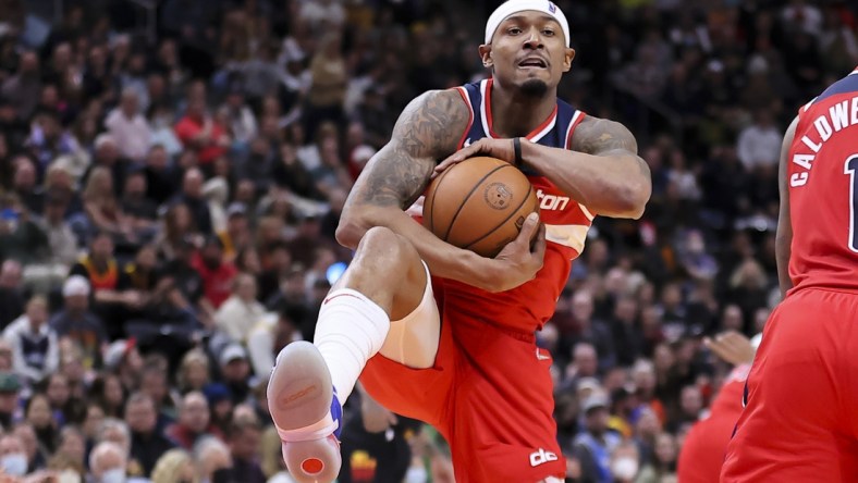 Dec 18, 2021; Salt Lake City, Utah, USA; Washington Wizards guard Bradley Beal (3) secures a rebound in the fourth quarter against the Utah Jazz at Vivint Arena. Mandatory Credit: Rob Gray-USA TODAY Sports