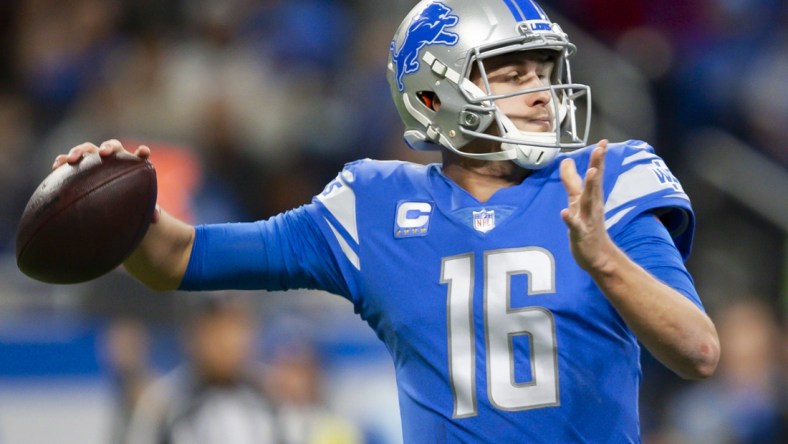 Dec 19, 2021; Detroit, Michigan, USA; Detroit Lions quarterback Jared Goff (16) passes the ball during the first quarter against the Arizona Cardinals at Ford Field. Mandatory Credit: Raj Mehta-USA TODAY Sports