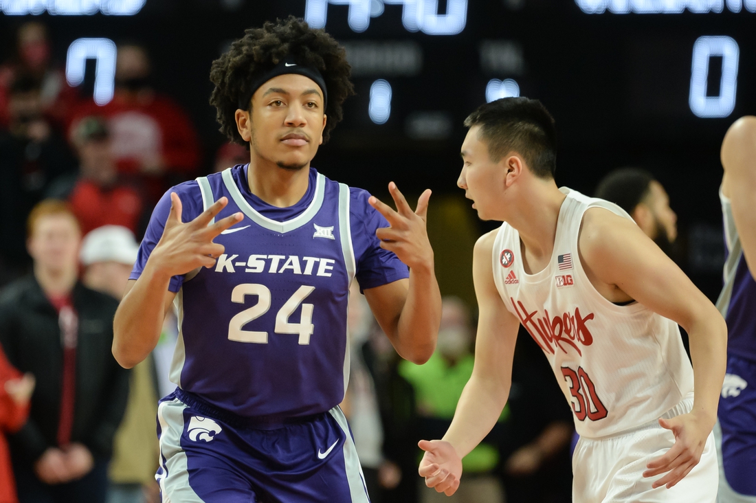 Dec 19, 2021; Lincoln, Nebraska, USA;  Kansas State Wildcats guard Nijel Pack (24) reacts after a three point basket against the Nebraska Cornhuskers in the first half at Pinnacle Bank Arena. Mandatory Credit: Steven Branscombe-USA TODAY Sports