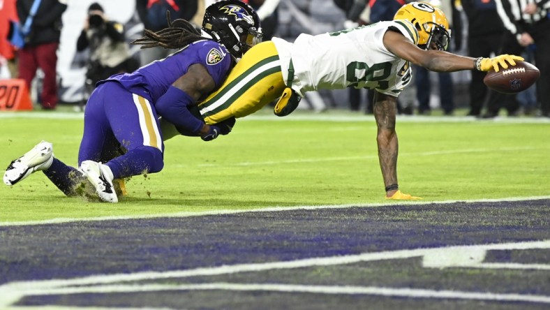 Dec 19, 2021; Baltimore, Maryland, USA;  Green Bay Packers wide receiver Marquez Valdes-Scantling (83)] divers for a touchdown  during the second half HG at M&T Bank Stadium. Mandatory Credit: Tommy Gilligan-USA TODAY Sports