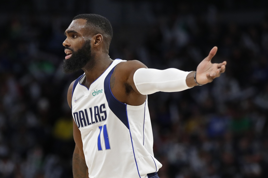 Dec 19, 2021; Minneapolis, Minnesota, USA; Dallas Mavericks guard Tim Hardaway Jr. (11) questions a referee about a call with the Minnesota Timberwolves in the third quarter at Target Center. Mandatory Credit: Bruce Kluckhohn-USA TODAY Sports