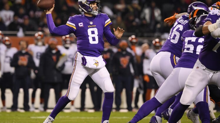 Dec 20, 2021; Chicago, Illinois, USA; Minnesota Vikings quarterback Kirk Cousins (8) passes in the first quarter against the Chicago Bears at Soldier Field. Mandatory Credit: Quinn Harris-USA TODAY Sports