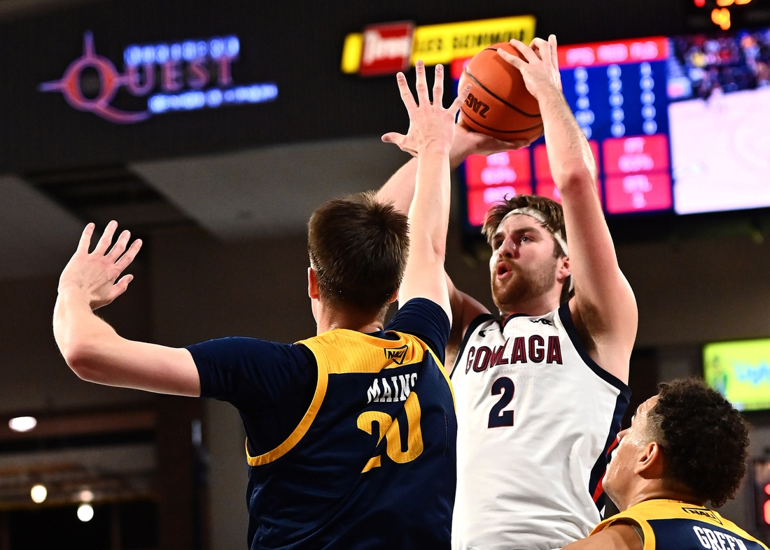 Dec 20, 2021; Spokane, Washington, USA; Gonzaga Bulldogs forward Drew Timme (2) shoots the ball against Northern Arizona Lumberjacks forward Nik Mains (20) in the first half at McCarthey Athletic Center. Mandatory Credit: James Snook-USA TODAY Sports