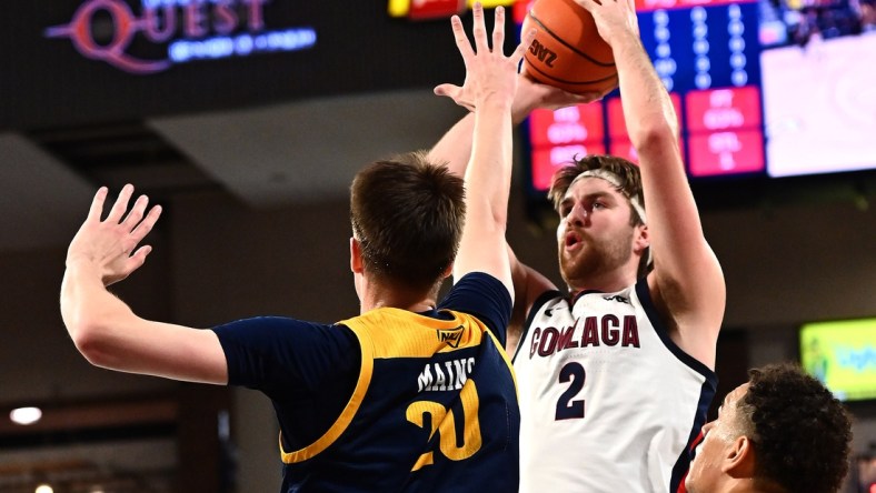 Dec 20, 2021; Spokane, Washington, USA; Gonzaga Bulldogs forward Drew Timme (2) shoots the ball against Northern Arizona Lumberjacks forward Nik Mains (20) in the first half at McCarthey Athletic Center. Mandatory Credit: James Snook-USA TODAY Sports