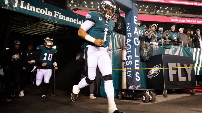 Dec 21, 2021; Philadelphia, Pennsylvania, USA; Philadelphia Eagles quarterbacks Jalen Hurts (1) and Gardner Minshew (10) run out of the tunnel for warmups before the game against the Washington Football Team at Lincoln Financial Field. Mandatory Credit: Bill Streicher-USA TODAY Sports