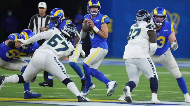 Dec 21, 2021; Inglewood, California, USA; Los Angeles Rams quarterback Matthew Stafford (9) throws the ball against the Seattle Seahawks in the first half at SoFi Stadium. Mandatory Credit: Kirby Lee-USA TODAY Sports