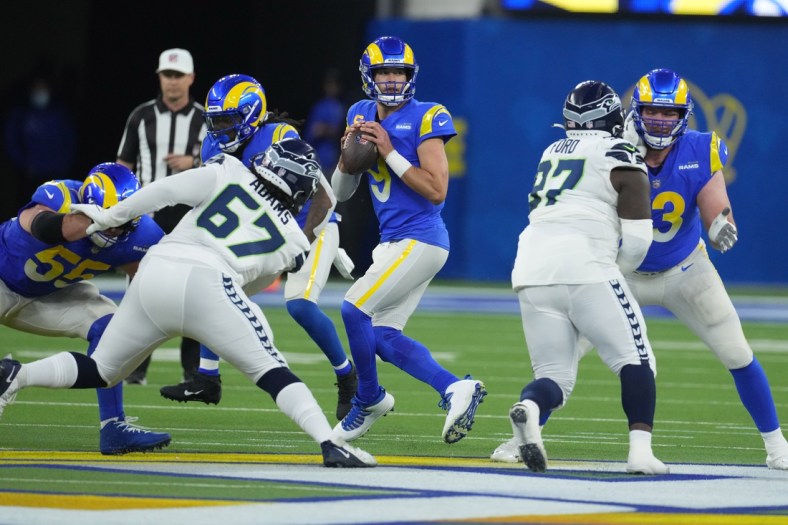 Dec 21, 2021; Inglewood, California, USA; Los Angeles Rams quarterback Matthew Stafford (9) throws the ball against the Seattle Seahawks in the first half at SoFi Stadium. Mandatory Credit: Kirby Lee-USA TODAY Sports