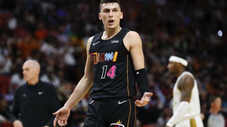 Dec 21, 2021; Miami, Florida, USA; Miami Heat guard Tyler Herro (14) reacts toward a game official during the first half  of the game against the Indiana Pacers at FTX Arena. Mandatory Credit: Sam Navarro-USA TODAY Sports