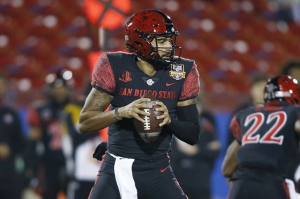 Dec 21, 2021; Frisco, TX, USA; San Diego State Aztecs quarterback Lucas Johnson (7) looks to pass in the first quarter against the UTSA Roadrunners during the 2021 Frisco Bowl at Toyota Stadium. Mandatory Credit: Tim Heitman-USA TODAY Sports