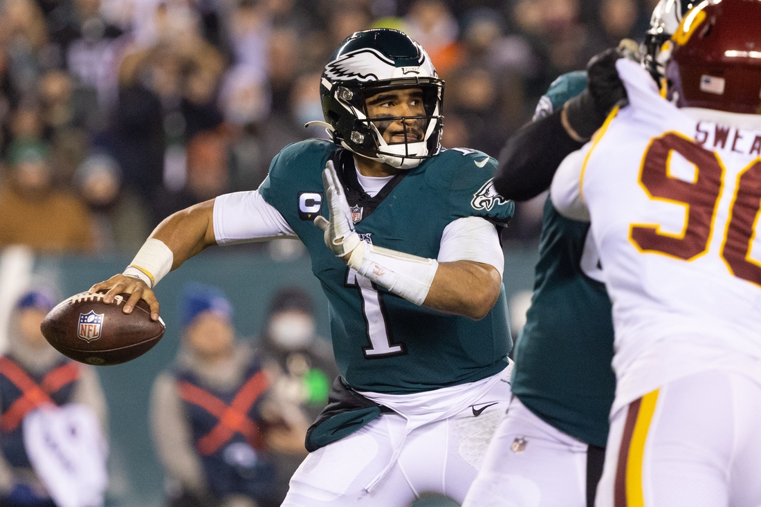 Dec 21, 2021; Philadelphia, Pennsylvania, USA; Philadelphia Eagles quarterback Jalen Hurts (1) passes the ball against the Washington Football Team during the fourth quarter at Lincoln Financial Field. Mandatory Credit: Bill Streicher-USA TODAY Sports