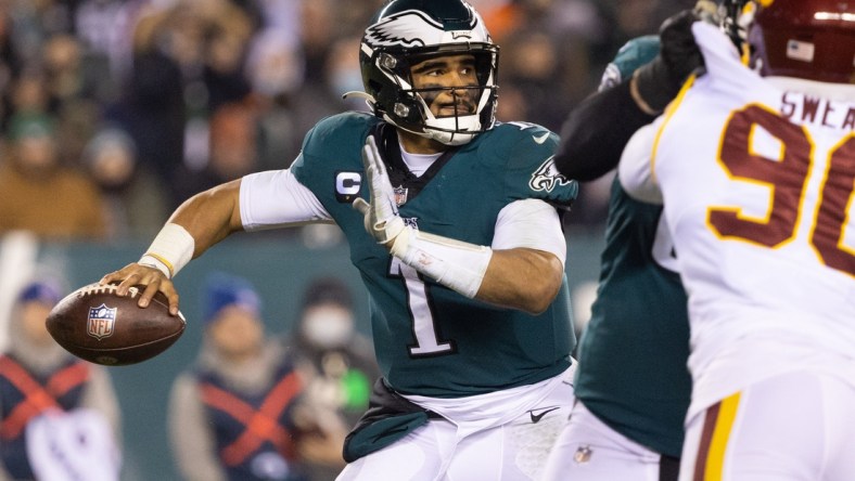 Dec 21, 2021; Philadelphia, Pennsylvania, USA; Philadelphia Eagles quarterback Jalen Hurts (1) passes the ball against the Washington Football Team during the fourth quarter at Lincoln Financial Field. Mandatory Credit: Bill Streicher-USA TODAY Sports