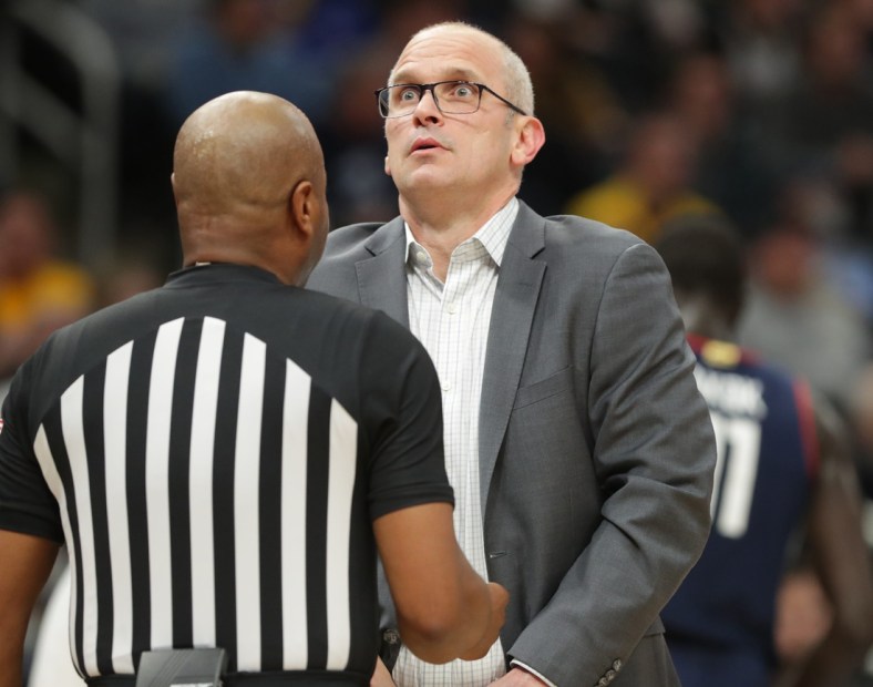 Connecticut head coach Dan Hurley talks to an official  during the first half of their game against Marquette Tuesday, December 21, 2021 at Fiserv Forum in Milwaukee, Wis.MARK HOFFMAN/MILWAUKEE JOURNAL SENTINEL

Mjs Mumen22 15 Jpg Mumen22