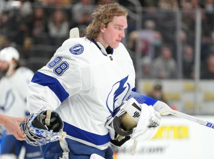 Dec 21, 2021; Las Vegas, Nevada, USA; Tampa Bay Lightning goaltender Andrei Vasilevskiy (88) skates towards his bench after having his helmet knocked off during a second period play against the Golden Knights at T-Mobile Arena. Mandatory Credit: Stephen R. Sylvanie-USA TODAY Sports