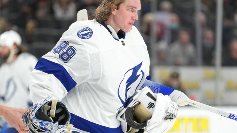 Dec 21, 2021; Las Vegas, Nevada, USA; Tampa Bay Lightning goaltender Andrei Vasilevskiy (88) skates towards his bench after having his helmet knocked off during a second period play against the Golden Knights at T-Mobile Arena. Mandatory Credit: Stephen R. Sylvanie-USA TODAY Sports