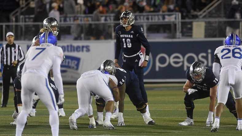 Nevada quarterback Nate Cox (16) sees some action against Air Force at Mackay Stadium in Reno on Nov. 19, 2021.

Ren Nate Cox 01