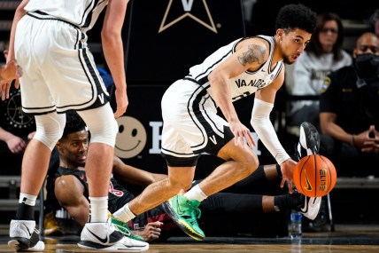 Vanderbilt guard Scotty Pippen Jr. (2) gets the ball away from Temple forward Sage Tolbert III (3) during the first half at Memorial Gym in Nashville, Tenn., Tuesday, Dec. 7, 2021.

Vandy Temple 120721 An 014