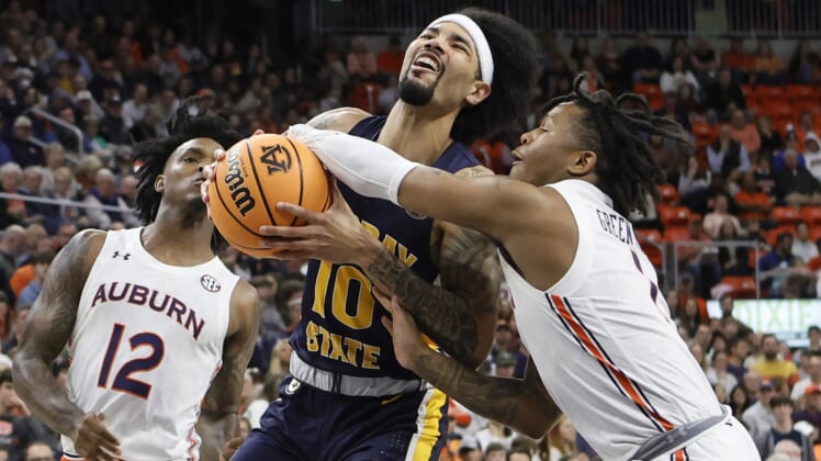 Dec 22, 2021; Auburn, Alabama, USA;  Murray State Racers guard Tevin Brown (10) is fouled by Auburn Tigers guard Wendell Green Jr. (1) during the first half at Auburn Arena. Mandatory Credit: John Reed-USA TODAY Sports