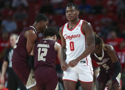 Dec 22, 2021; Houston, Texas, USA; Houston Cougars guard Marcus Sasser (0) reacts after a play during the first half against the Texas State Bobcats at Fertitta Center. Mandatory Credit: Troy Taormina-USA TODAY Sports