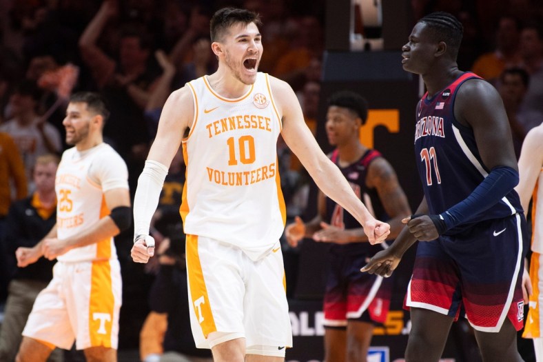 Tennessee forward John Fulkerson (10) celebrates a play during a basketball game between the Tennessee Volunteers and the Arizona Wildcats at Thompson-Boling Arena in Knoxville, Tenn., on Wednesday, Dec. 22, 2021.

Kns Vols Arizona Hoops Bp