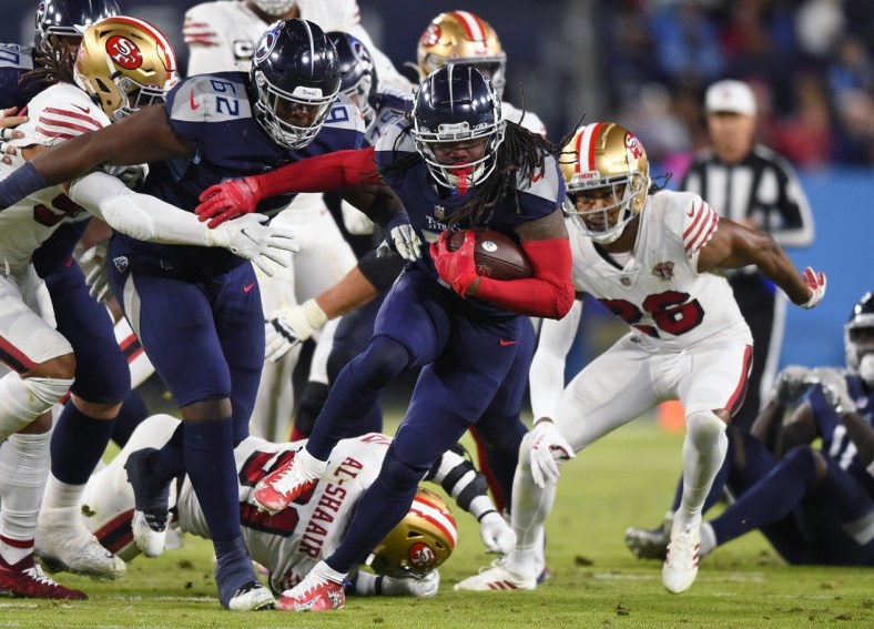 Dec 23, 2021; Nashville, Tennessee, USA;  Tennessee Titans running back D'Onta Forman (7) runs the ball during the first half against the San Francisco 49ers at Nissan Stadium. Mandatory Credit: Steve Roberts-USA TODAY Sports