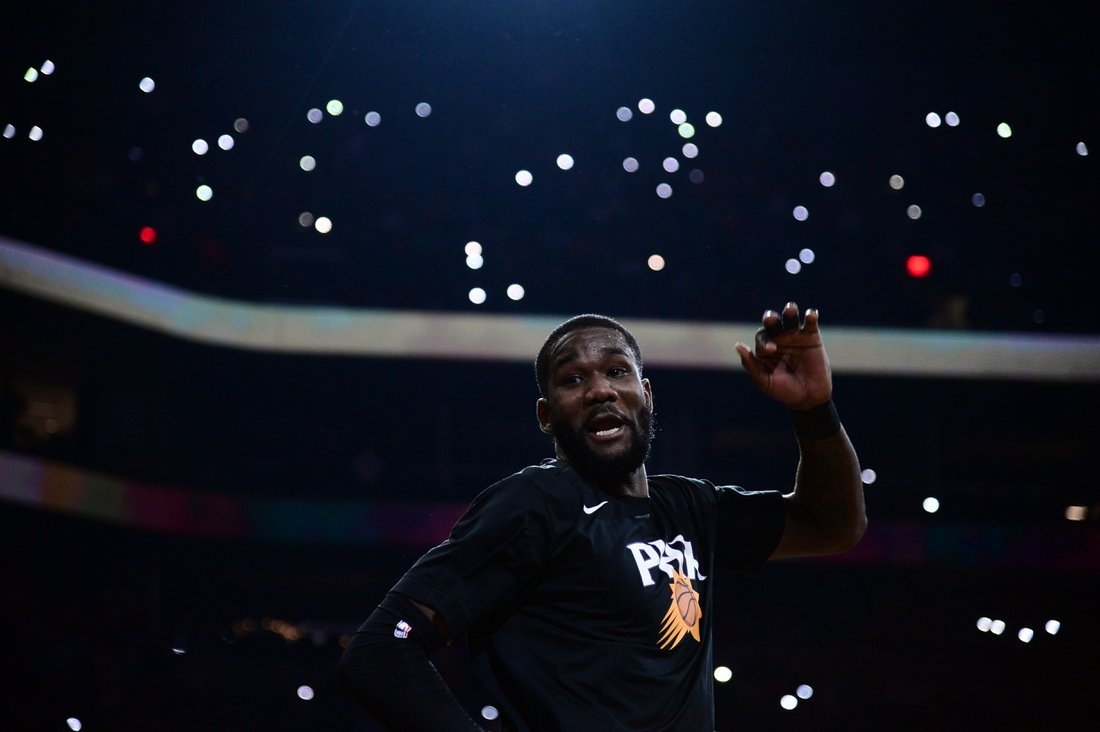 Dec 23, 2021; Phoenix, Arizona, USA; Phoenix Suns center Deandre Ayton (22) is introduced before the game against the Oklahoma City Thunder at Footprint Center. Mandatory Credit: Joe Camporeale-USA TODAY Sports