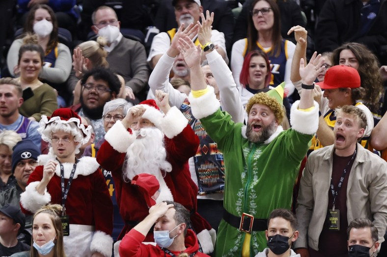 Dec 23, 2021; Salt Lake City, Utah, USA; Utah Jazz fans show their Christmas spirit against the Minnesota Timberwolves at Vivint Arena. Mandatory Credit: Jeffrey Swinger-USA TODAY Sports