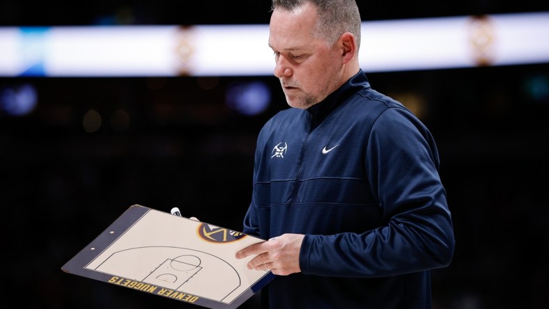 Dec 23, 2021; Denver, Colorado, USA; Denver Nuggets head coach Michael Malone in the second quarter against the Charlotte Hornets at Ball Arena. Mandatory Credit: Isaiah J. Downing-USA TODAY Sports
