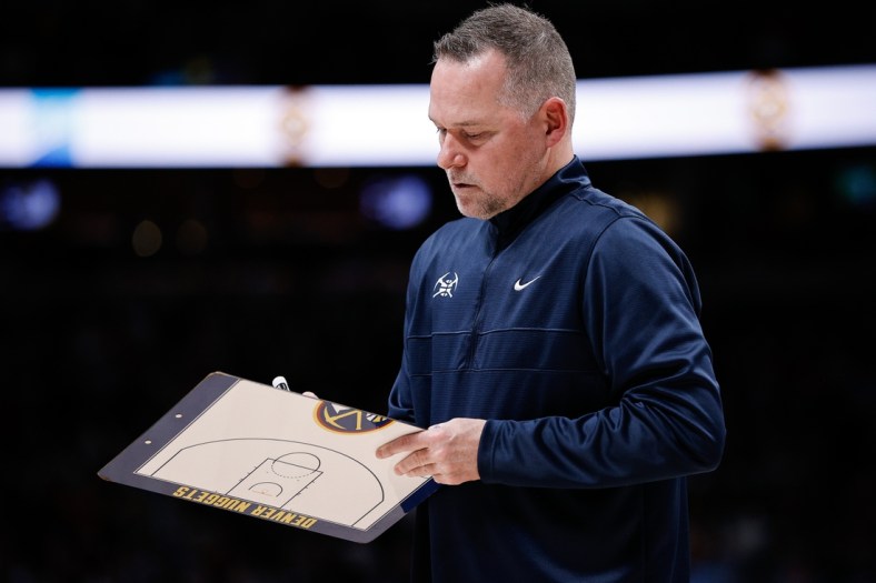 Dec 23, 2021; Denver, Colorado, USA; Denver Nuggets head coach Michael Malone in the second quarter against the Charlotte Hornets at Ball Arena. Mandatory Credit: Isaiah J. Downing-USA TODAY Sports