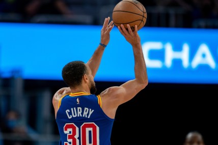 Dec 23, 2021; San Francisco, California, USA; Golden State Warriors guard Stephen Curry (30) shoots a three-point basket during the third quarter against the Memphis Grizzlies at Chase Center. Mandatory Credit: Neville E. Guard-USA TODAY Sports