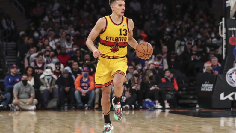 Dec 25, 2021; New York, New York, USA;  Atlanta Hawks guard Bogdan Bogdanovic (13) brings the ball up court in the second quarter against the New York Knicks at Madison Square Garden. Mandatory Credit: Wendell Cruz-USA TODAY Sports