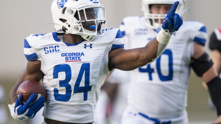 Dec 25, 2021; Montgomery, AL, USA;  Georgia State Panthers safety Antavious Lane (34) returns an interception for a touchdown against Ball State in the camellia Bowl at Cramton Bowl. Mandatory Credit: Mickey Welsh-USA TODAY Sports