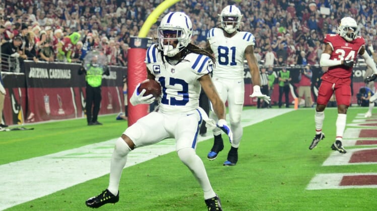 Dec 25, 2021; Glendale, Arizona, USA; Indianapolis Colts wide receiver T.Y. Hilton (13) makes a touchdown catch against the Arizona Cardinals during the first half at State Farm Stadium. Mandatory Credit: Joe Camporeale-USA TODAY Sports