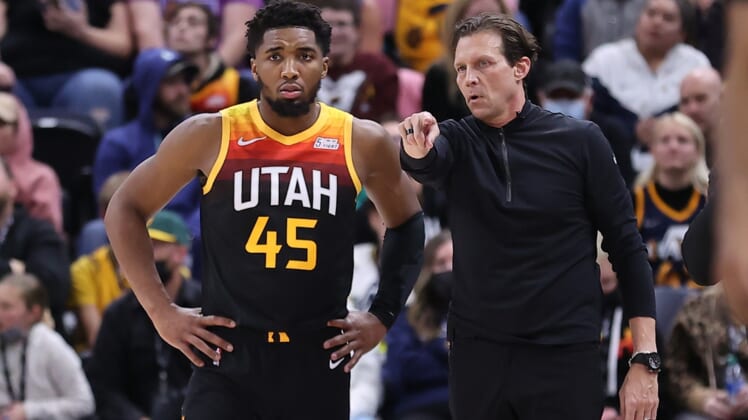 Dec 25, 2021; Salt Lake City, Utah, USA; Utah Jazz guard Donovan Mitchell (45) and head coach Quin Snyder speak during a break in action in the fourth quarter at Vivint Arena. Mandatory Credit: Rob Gray-USA TODAY Sports