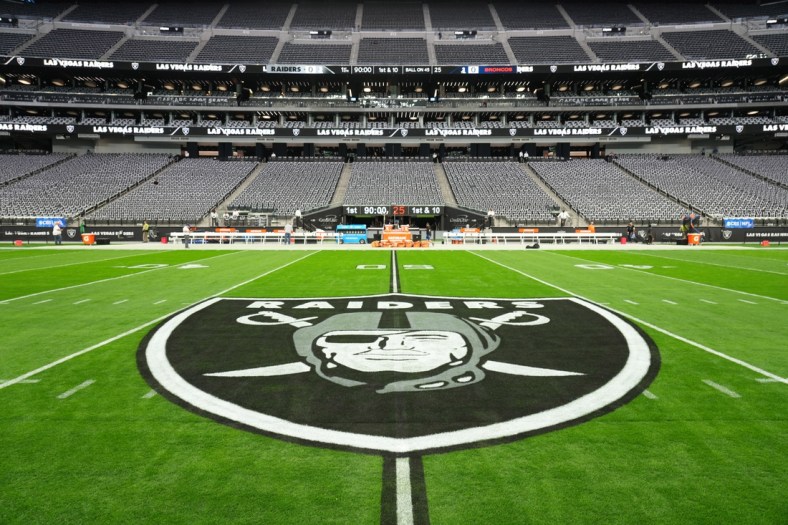 Dec 26, 2021; Paradise, Nevada, USA; A detailed view of the Las Vegas Raiders shield logo at midfield at Allegiant Stadium. Mandatory Credit: Kirby Lee-USA TODAY Sports