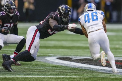 Dec 26, 2021; Atlanta, Georgia, USA; Detroit Lions running back Craig Reynolds (46) is tackled by Atlanta Falcons linebackers Foye Oluokun (54) during the second half at Mercedes-Benz Stadium. Mandatory Credit: Dale Zanine-USA TODAY Sports