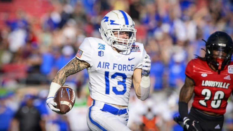 Dec 28, 2021; Dallas, Texas, USA; Air Force Falcons wide receiver Brandon Lewis (13) runs for his first of two touchdowns against the Louisville Cardinals during the first half during the 2021 First Responder Bowl at Gerald J. Ford Stadium. Mandatory Credit: Jerome Miron-USA TODAY Sports